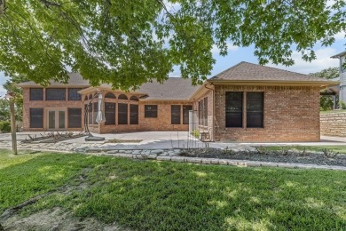 Welcome to this tastefully designed single-story home that sits on De Cordova Bend Country Club in Texas - for sale on GolfHomes.com, golf home, golf lot
