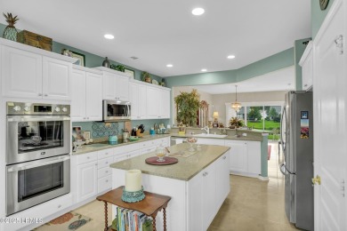 Beautifully updated Lilac model on a premium lagoon-view lot in on Hidden Cypress Golf Club in South Carolina - for sale on GolfHomes.com, golf home, golf lot
