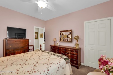 Beautifully updated Lilac model on a premium lagoon-view lot in on Hidden Cypress Golf Club in South Carolina - for sale on GolfHomes.com, golf home, golf lot