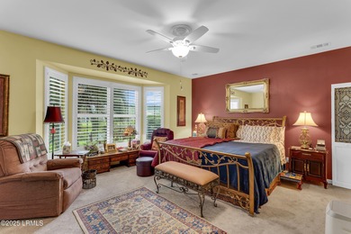 Beautifully updated Lilac model on a premium lagoon-view lot in on Hidden Cypress Golf Club in South Carolina - for sale on GolfHomes.com, golf home, golf lot