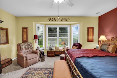 Beautifully updated Lilac model on a premium lagoon-view lot in on Hidden Cypress Golf Club in South Carolina - for sale on GolfHomes.com, golf home, golf lot