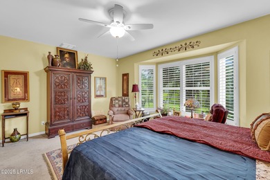 Beautifully updated Lilac model on a premium lagoon-view lot in on Hidden Cypress Golf Club in South Carolina - for sale on GolfHomes.com, golf home, golf lot