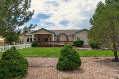 Enjoy your beautiful views of of the Pueblo West golf coarse on Desert Hawk At Pueblo West in Colorado - for sale on GolfHomes.com, golf home, golf lot