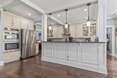 Perfectly positioned on a sprawling 0.76-acre lot overlooking on Myrtlewood Golf Course and Club  in South Carolina - for sale on GolfHomes.com, golf home, golf lot