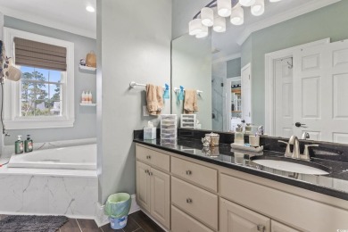 Perfectly positioned on a sprawling 0.76-acre lot overlooking on Myrtlewood Golf Course and Club  in South Carolina - for sale on GolfHomes.com, golf home, golf lot
