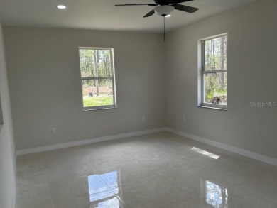 MOVE-IN READY! Brand New house on a  1/2  acre lot in Lake on Indian Lake Estates Golf and Country Club in Florida - for sale on GolfHomes.com, golf home, golf lot