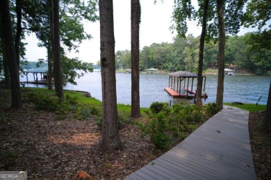 Dive into lakeside luxury at its finest in the heart of Turtle on Turtle Cove Golf Course in Georgia - for sale on GolfHomes.com, golf home, golf lot