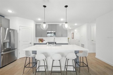 Discover the perfect blend of elegance, comfort, and private on The Grand Club - Pine Lakes Course in Florida - for sale on GolfHomes.com, golf home, golf lot