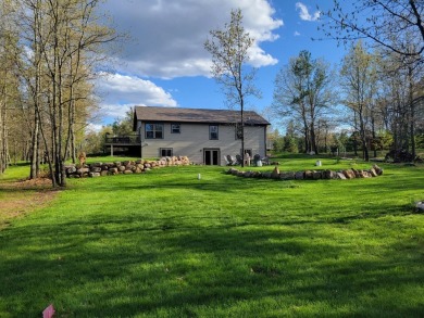 Stately ranch home on the 13th fairway of the Pines Golf Course on Lake Arrowhead Golf Course - The Pines in Wisconsin - for sale on GolfHomes.com, golf home, golf lot