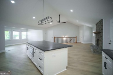 Dive into lakeside luxury at its finest in the heart of Turtle on Turtle Cove Golf Course in Georgia - for sale on GolfHomes.com, golf home, golf lot