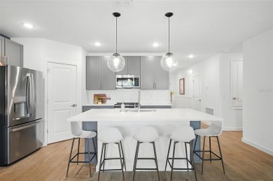 Discover the perfect blend of elegance, comfort, and private on The Grand Club - Pine Lakes Course in Florida - for sale on GolfHomes.com, golf home, golf lot