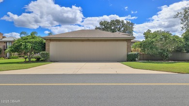 Contemporary, two story brick home has elegance and style on Spruce Creek Golf Club in Florida - for sale on GolfHomes.com, golf home, golf lot