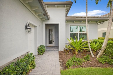 This 2022 built home sits on the preserve with incredible views on Ibis Golf and Country Club in Florida - for sale on GolfHomes.com, golf home, golf lot