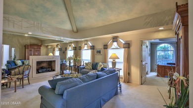 Contemporary, two story brick home has elegance and style on Spruce Creek Golf Club in Florida - for sale on GolfHomes.com, golf home, golf lot