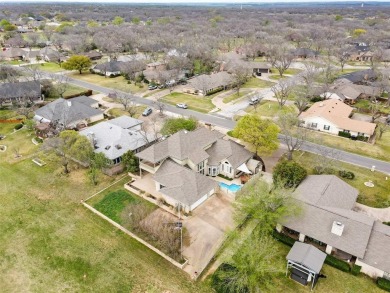 Homes of this caliber are rare! Experience luxury living in this on Pecan Plantation Country Club in Texas - for sale on GolfHomes.com, golf home, golf lot