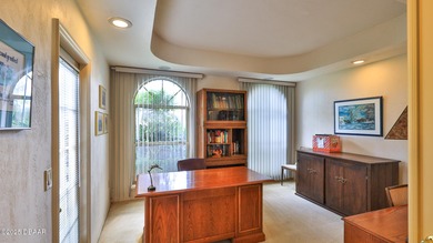 Contemporary, two story brick home has elegance and style on Spruce Creek Golf Club in Florida - for sale on GolfHomes.com, golf home, golf lot