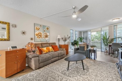 Beautifully maintained 2-bed, 2-bath condo with spacious open on Inverrary Country Club in Florida - for sale on GolfHomes.com, golf home, golf lot