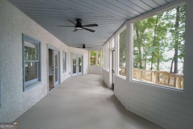 Dive into lakeside luxury at its finest in the heart of Turtle on Turtle Cove Golf Course in Georgia - for sale on GolfHomes.com, golf home, golf lot