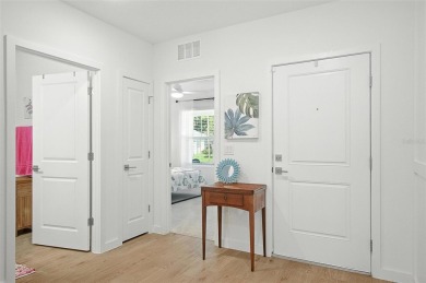 Discover the perfect blend of elegance, comfort, and private on The Grand Club - Pine Lakes Course in Florida - for sale on GolfHomes.com, golf home, golf lot