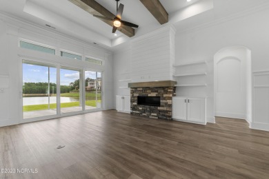 Are you looking for a custom home with tons of details and on Brunswick Plantation and Golf Resorts in North Carolina - for sale on GolfHomes.com, golf home, golf lot