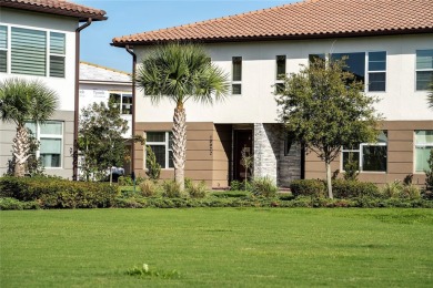 Stunning Move-In Ready Townhome in the Prestigious Gated on Eagle Creek Golf Club in Florida - for sale on GolfHomes.com, golf home, golf lot