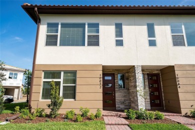 Stunning Move-In Ready Townhome in the Prestigious Gated on Eagle Creek Golf Club in Florida - for sale on GolfHomes.com, golf home, golf lot