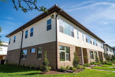 Stunning Move-In Ready Townhome in the Prestigious Gated on Eagle Creek Golf Club in Florida - for sale on GolfHomes.com, golf home, golf lot