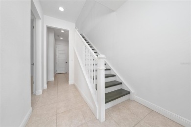 Stunning Move-In Ready Townhome in the Prestigious Gated on Eagle Creek Golf Club in Florida - for sale on GolfHomes.com, golf home, golf lot