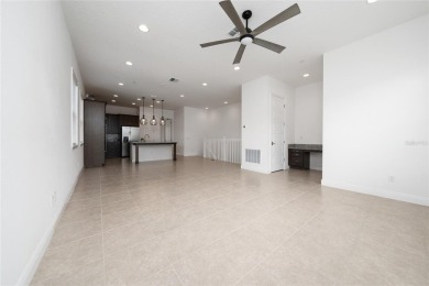 Stunning Move-In Ready Townhome in the Prestigious Gated on Eagle Creek Golf Club in Florida - for sale on GolfHomes.com, golf home, golf lot