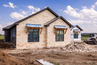 NEW CONSTRUCTION HILL COUNTRY HOME BY MENGER CREEK BUILDERS sits on The Club At Comanche Trace in Texas - for sale on GolfHomes.com, golf home, golf lot
