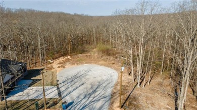 Discover the natural beauty of this 4.31-acre property, located on Bella Vista - Metfield Golf Complex and Country Club in Arkansas - for sale on GolfHomes.com, golf home, golf lot