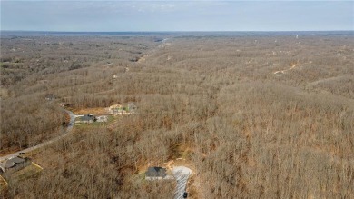 Discover the natural beauty of this 4.31-acre property, located on Bella Vista - Metfield Golf Complex and Country Club in Arkansas - for sale on GolfHomes.com, golf home, golf lot