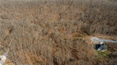 Discover the natural beauty of this 4.31-acre property, located on Bella Vista - Metfield Golf Complex and Country Club in Arkansas - for sale on GolfHomes.com, golf home, golf lot