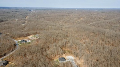 Discover the natural beauty of this 4.31-acre property, located on Bella Vista - Metfield Golf Complex and Country Club in Arkansas - for sale on GolfHomes.com, golf home, golf lot