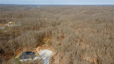 Discover the natural beauty of this 4.31-acre property, located on Bella Vista - Metfield Golf Complex and Country Club in Arkansas - for sale on GolfHomes.com, golf home, golf lot