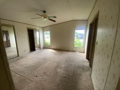 Mobile home located in Savanna Club where you own the land!  A on Savanna Golf Club in Florida - for sale on GolfHomes.com, golf home, golf lot