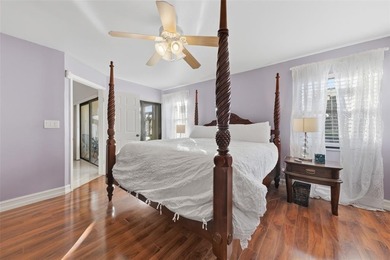 MAJOR PRICE IMPROVEMENT! WILL NOT LAST ...Beautifully maintained on Woodmont Country Club in Florida - for sale on GolfHomes.com, golf home, golf lot