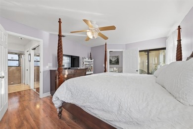 MAJOR PRICE IMPROVEMENT! WILL NOT LAST ...Beautifully maintained on Woodmont Country Club in Florida - for sale on GolfHomes.com, golf home, golf lot