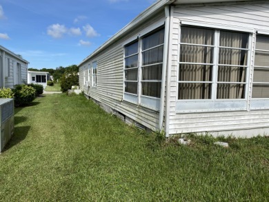 Mobile home located in Savanna Club where you own the land!  A on Savanna Golf Club in Florida - for sale on GolfHomes.com, golf home, golf lot