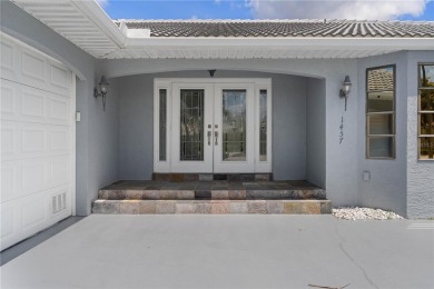 One or more photo(s) has been virtually staged. PGI WATERFRONT on Saint Andrews South Golf Club in Florida - for sale on GolfHomes.com, golf home, golf lot