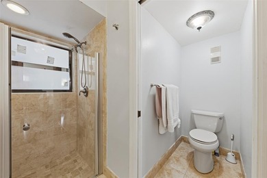 MAJOR PRICE IMPROVEMENT! WILL NOT LAST ...Beautifully maintained on Woodmont Country Club in Florida - for sale on GolfHomes.com, golf home, golf lot