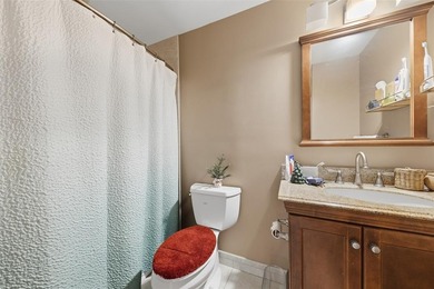 MAJOR PRICE IMPROVEMENT! WILL NOT LAST ...Beautifully maintained on Woodmont Country Club in Florida - for sale on GolfHomes.com, golf home, golf lot