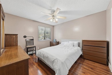 MAJOR PRICE IMPROVEMENT! WILL NOT LAST ...Beautifully maintained on Woodmont Country Club in Florida - for sale on GolfHomes.com, golf home, golf lot