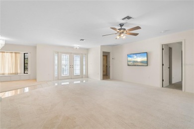 One or more photo(s) has been virtually staged. PGI WATERFRONT on Saint Andrews South Golf Club in Florida - for sale on GolfHomes.com, golf home, golf lot