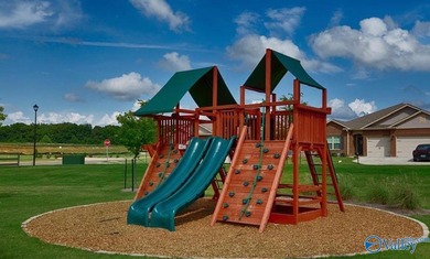 Less than 5 minutes to I-65 and Hwy 72 and neighbors Canebrake on Canebrake Golf Club in AL - for sale on GolfHomes.com, golf home, golf lot