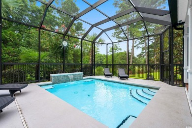 Welcome to this stunning two-story home situated on a premium on Barefoot Resort and Golf Club  in South Carolina - for sale on GolfHomes.com, golf home, golf lot