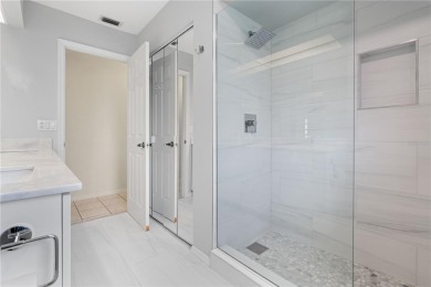 One or more photo(s) has been virtually staged. PGI WATERFRONT on Saint Andrews South Golf Club in Florida - for sale on GolfHomes.com, golf home, golf lot