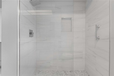 One or more photo(s) has been virtually staged. PGI WATERFRONT on Saint Andrews South Golf Club in Florida - for sale on GolfHomes.com, golf home, golf lot