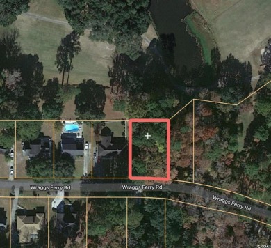 This is a unique opportunity to own a picturesque lot on the on Wedgefield Plantation Golf Club in South Carolina - for sale on GolfHomes.com, golf home, golf lot