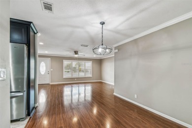 Welcome home! This beautifully updated and well-maintained on Mainlands Golf Club in Florida - for sale on GolfHomes.com, golf home, golf lot